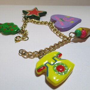 thumbnail image 2 of Bluebubble Retro Roller Boot Earrings – Silver Enamel Drop Dangles – 70s 80s Disco Kitsch 2 of 5