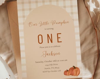 May include: A beige and white plaid invitation card with the text "Our Little Pumpkin is turning ONE". The card includes the name "Jackson", event details, and illustrations of pumpkins. The RSVP date is October 11th.