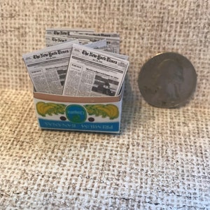 Miniature box of newspapers