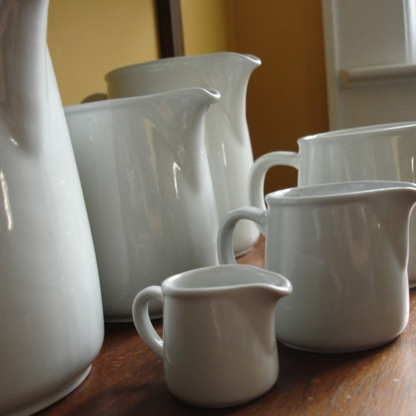 Gorgeous set of 6 Arabia Finland graduated pitchers. Kaj Franck