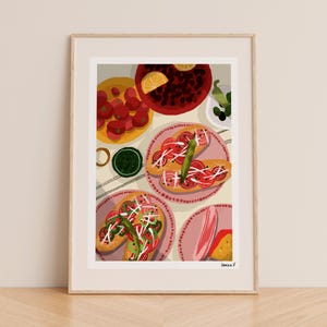May include: A framed art print featuring a still life of food. The image showcases plates of tomatoes, bread topped with tomatoes and onions, and other dishes. The color palette includes red, green, and pink.