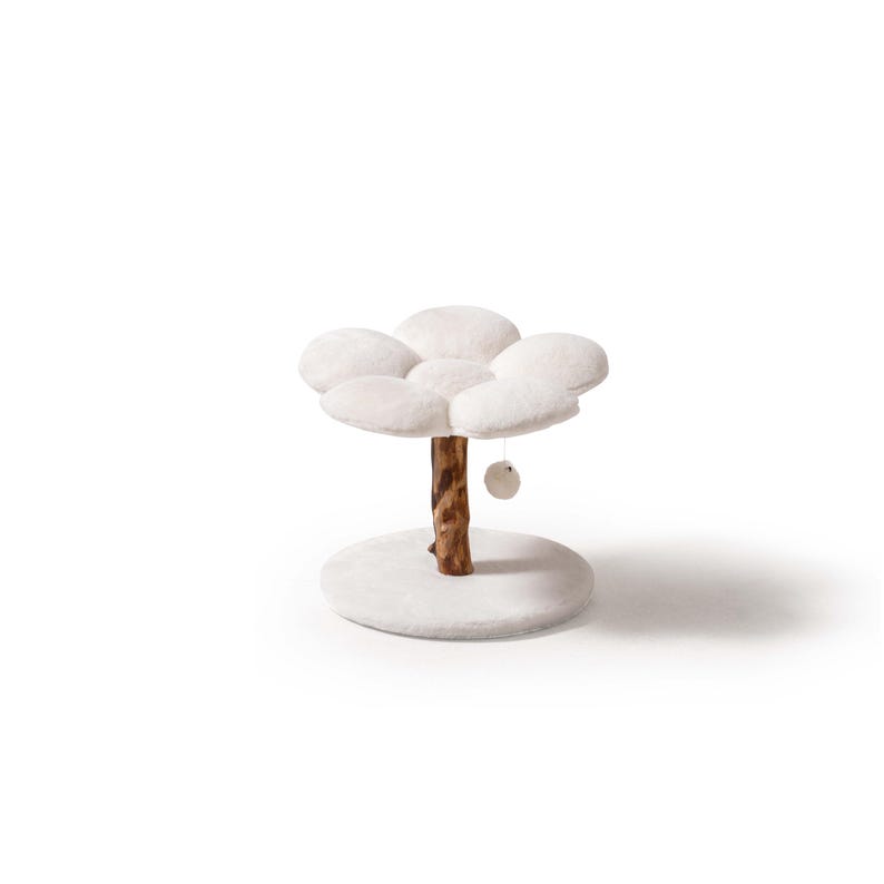 May include: A white cat tree shaped like a flower with a dangling ball toy. The tree has a brown wooden trunk and a white plush base.
