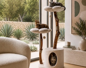 May include: A multi-level cat tree featuring two natural wood trunks with cream-colored, flower-shaped platforms and a cylindrical base with a hollow opening. Three cats are positioned on the structure, with one resting inside the base.