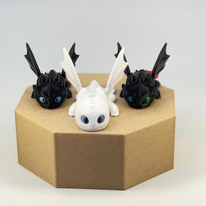 3D-geprinte Flexi-tandeloze drakenbaby's