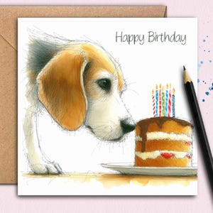 May include: A birthday card illustration of a beagle dog gazing at a layered cake with candles. The words "Happy Birthday" are written above the dog. A black pencil is placed on the right side of the card.