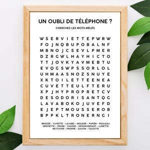 May include: A printable word search puzzle in a wooden frame. The puzzle is titled "Un Oubli de T&eacute;l&eacute;phone?" and asks the user to find the words hidden in the grid. The words are listed below the puzzle, including "Brosse", "Cuvette", "Lavabo", "Mousse", "Papier", "Rouleau", "Serviette", "Trone", "Chasse", "D&eacute;sodorisant", "Lunette", "Nettoyer", "Propre", "Savon", and "Toilette."