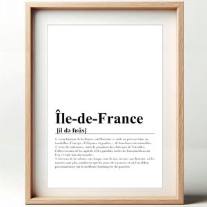 Könnte beinhalten: Ein gerahmter Druck mit einem hellen Holzrahmen. Der Druck zeigt den Text "Île-de-France" in fetter schwarzer Schrift, darunter eine phonetische Aussprache. Unter dem Titel befindet sich eine nummerierte Liste auf Französisch.