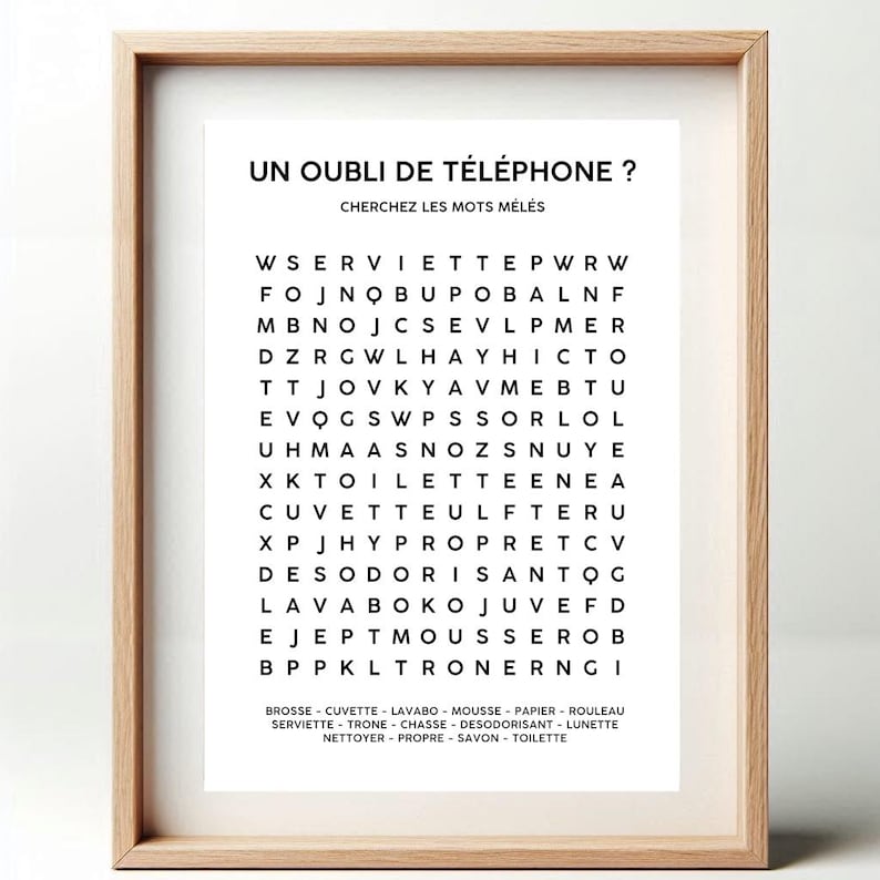 May include: A black and white word search puzzle with the title "Un Oubli de T&eacute;l&eacute;phone?" and the instructions "Cherchez les mots m&ecirc;l&eacute;s". The puzzle features a grid of letters with words to find related to bathroom items and hygiene.