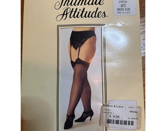 May include: A package of Intimate Attitudes sheer stockings. The package features a picture of black stockings with a garter belt. The text on the package reads "Intimate Attitudes", "Sheer Stocking", and "Queen Size".