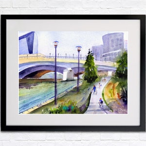 May include: Watercolor painting of a bridge over a river with people walking and biking on a path along the riverbank. The bridge is made of concrete and has a light blue railing. There are trees and buildings in the background.