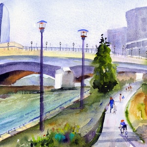 May include: A watercolor painting of a bridge over a river with people walking and biking on a path along the riverbank. The bridge is made of stone and has a light yellow railing. There are two lampposts on the path, and a large building in the background.
