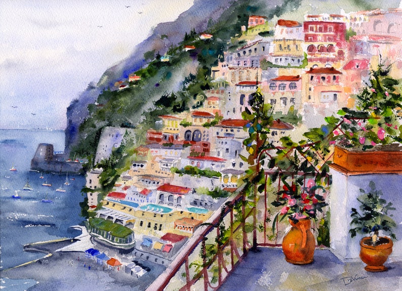 May include: A watercolor painting of a colorful Italian village built on a hillside overlooking the ocean. The scene is viewed from a balcony with potted plants and a terracotta vase.