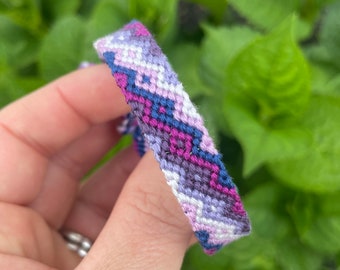 Friendship Bracelet with zigzags and diamonds in shades of blue, purple, and white - handmade macrame jewelry