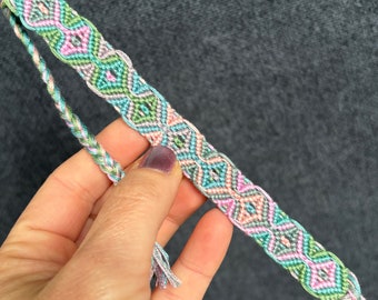 Friendship bracelet in sleeping tikis pattern - handmade macrame jewelry