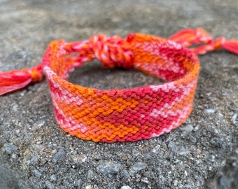 Friendship Bracelet - flame pattern in bright colors of orange, pink, & red - handmade macrame jewelry