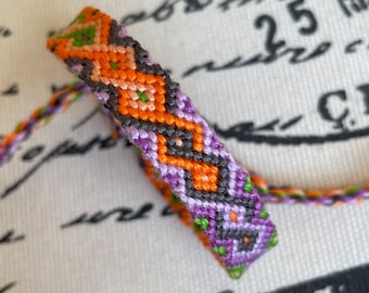 Friendship Bracelet in orange, green, and purple - with twisting diamond flame pattern - handmade macrame bracelet