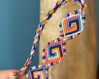 Friendship Bracelet with Spiral medallions and shaped edges - handmade macrame jewelry