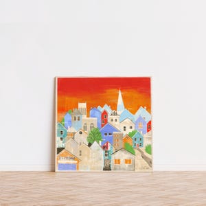 街中を横切る - 活気のある街並みの壁アート。12 x 12 インチの正方形サイズ