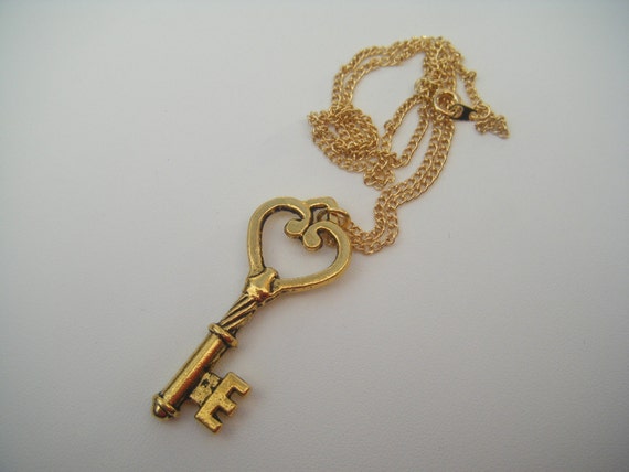 Items similar to ALICE IN WONDERLAND HEART SHAPED KEY CHARM NECKLACE ...