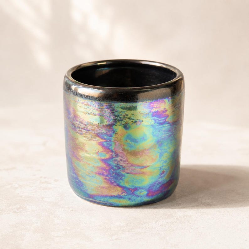 Iridescent ceramic planter with coordinating handmade pearl lustre plate, shown without plant