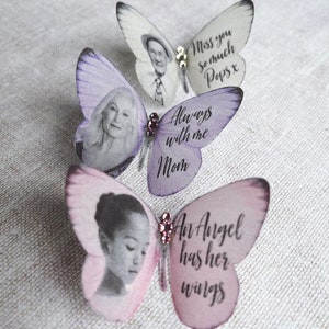 Silk butterfly wedding keepsake brooches in pale pink, lilac and white. Customised with images and words. sparkling crystals in the centre