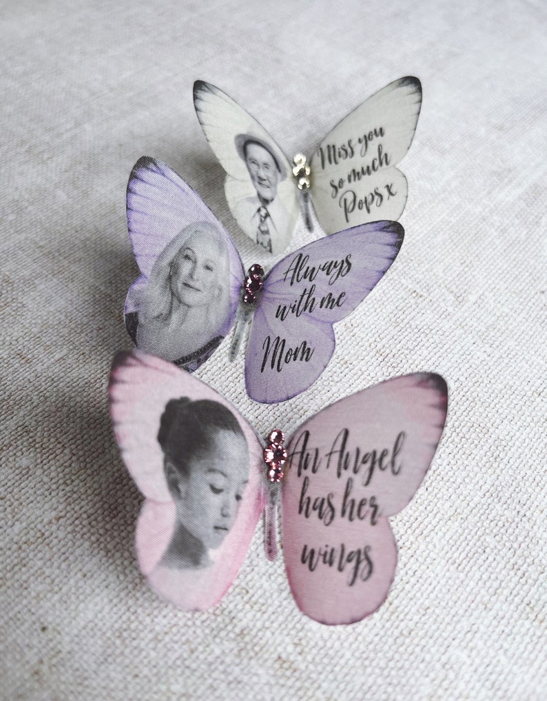 Silk butterfly wedding keepsake brooches in pale pink, lilac and white. Customised with images and words. sparkling crystals in the centre