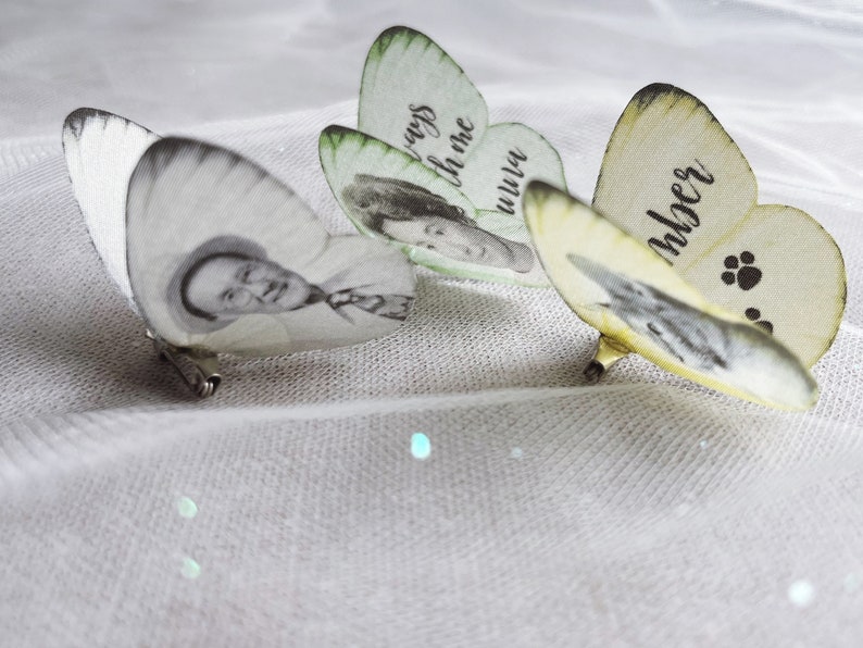 This image show the butterflies from an angle so you can see the images and how delicate the wings are. The colours are pale green, pale yellow and white