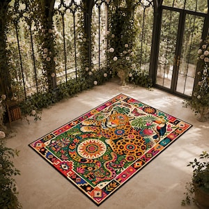 May include: A rectangular area rug featuring a vibrant, multi-coloured illustration of a leopard surrounded by tropical flora, a toucan, and geometric patterns. The design includes a central sun motif, stylised eyes, and intricate borders in shades of orange, green, blue, and pink.