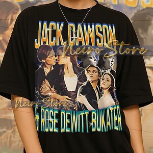 May include: Black t-shirt with a graphic from the film "Titanic", including the text "JACK DAWSON & ROSE DEWITT BUKATER". The design has a retro aesthetic.