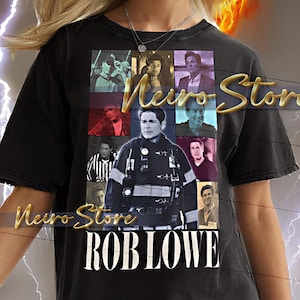 May include: Black t-shirt with a collage of images and the text "Neiro Store ROB LOWE." The shirt has a crew neck and short sleeves. The model is wearing a 2XL shirt.