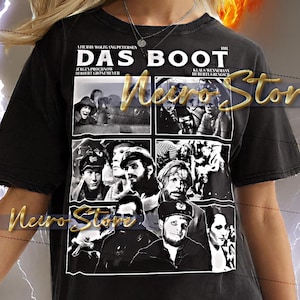 以下が含まれることがあります： 白黒の映画ポスターデザインが施された黒色のユニセックスTシャツ。映画は「Das Boot」です。Tシャツは半袖とクルーネックです。「Neiro Store」の文字も表示されています。