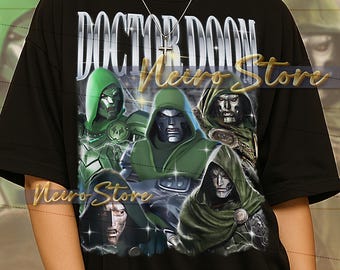 May include: Black t-shirt featuring a graphic of Doctor Doom with the text "DOCTOR DOOM" in a silver font. The graphic includes multiple images of Doctor Doom in green and silver. The shirt is a unisex style.