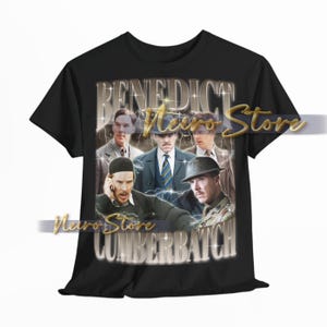 May include: Black t-shirt featuring a vintage-style graphic of Benedict Cumberbatch in various roles. The design includes the name "BENEDICT CUMBERBATCH" in a stylized font, with a lightning bolt effect.