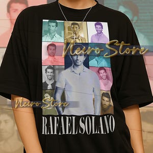 May include: Black unisex t-shirt featuring a collage of images and the text "RAFAEL SOLANO". The shirt has the text "Meiro Store" in a gold color. The model is wearing an XL sized shirt.
