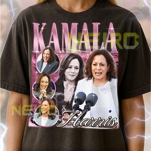 May include: Dark gray unisex t-shirt featuring a graphic of Kamala Harris with the text "KAMALA" and "Harris". The design includes multiple images of Harris. The shirt has a vintage style.