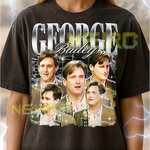 May include: Dark gray unisex t-shirt featuring a collage of images of George Bailey with the text "GEORGE Bailey" in a distressed style. The shirt has a vintage look and feel.