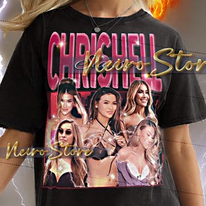 May include: Black unisex t-shirt featuring a graphic design with the text "CHRISHELL Neiro Store" in a pink and gold font. The shirt has a collage of women's images. The model is wearing a 2XL shirt.
