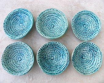 Textured turquoise ceramic bowl