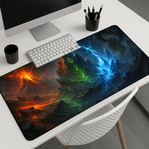 May include: A rectangular desk mat featuring a fantasy landscape design. The mat is divided into two sections: one with fiery orange and red volcanic imagery, and the other with a cool blue and green crystalline structure. A keyboard and other office supplies are on the desk.