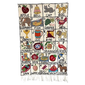 Handwoven Wool Alphabet Tapestry: Ethical Nursery Wall Hanging