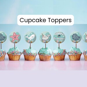May include: Set of six cupcake toppers featuring a variety of ocean-themed designs, including a starfish, a whale, a narwhal, a seashell, and a "Happy Birthday" banner.
