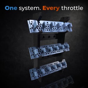 May include: A black and blue system with the text "One system. Every throttle." The system has three levels with multiple blue square buttons. The system is designed to hold multiple throttles.