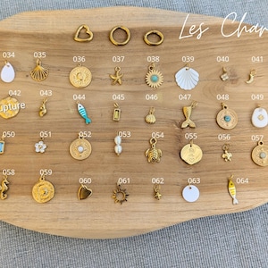 Individual charms, gold-plated stainless steel charms, initials, natural stones, mother-of-pearl. Themes: love, sea, seashell, eye...