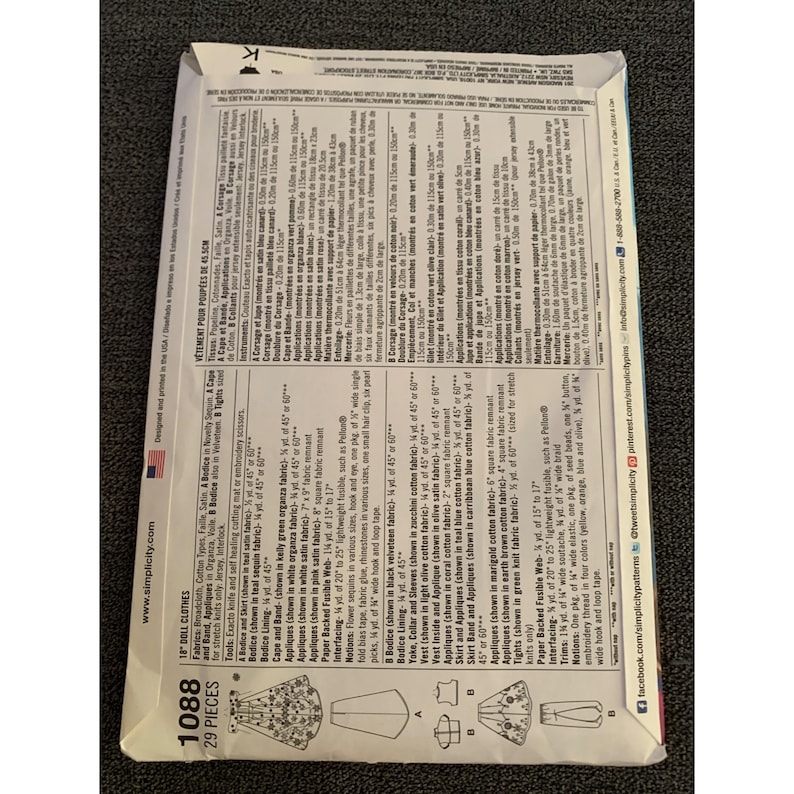 May include: A sewing pattern for doll clothes, featuring a teal satin bodice and skirt, a black velveteen bodice, and a green knit fabric for tights. The pattern includes instructions for making a cape, vest, and appliques. The pattern number is 1088 and includes 29 pieces.