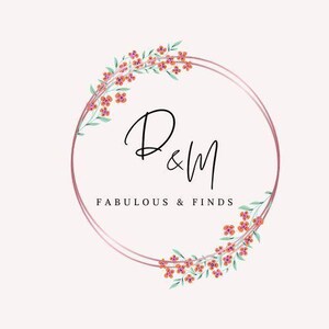 May include: A logo featuring a double pink ring with floral accents and the text "D&M FABULOUS & FINDS" in a delicate script font. The flowers are orange and pink.