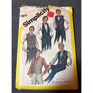 May include: Vintage Simplicity pattern envelope featuring illustrations of men's vests and formal wear. The envelope is yellow with the Simplicity logo and the price $3.50 USA. The pattern includes a bonus chart on how to work with plaids.