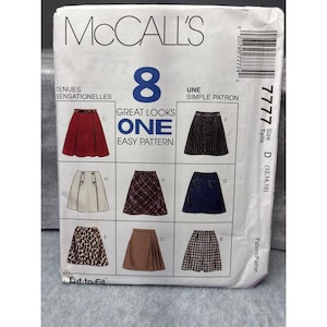 May include: McCall's sewing pattern featuring eight skirt designs. The package includes a variety of styles, including pleated, A-line, and denim skirts. The pattern is size D (12, 14, 16) and includes the text "Great Looks One Easy Pattern".