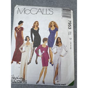 May include: McCall's sewing pattern featuring illustrations of various dress designs. The pattern includes a range of sizes, indicated as size D (12, 14, 16). The cover displays the McCall's logo and the text "Fashion Basics".