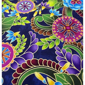 May include: A fabric featuring a deep blue background with a vibrant pattern of magenta and purple circular medallions, stylized green leaves, and bright blue floral elements, all outlined with thin, shimmering gold metallic lines.