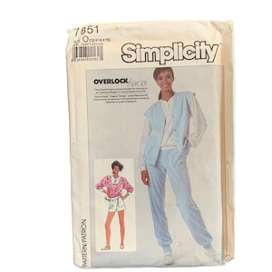 May include: Simplicity sewing pattern 7851. The pattern features a woman wearing a light blue sweatsuit. The pattern includes instructions for sewing on an Overlock/Serger or conventional machine. The pattern size is O (12+14+16).